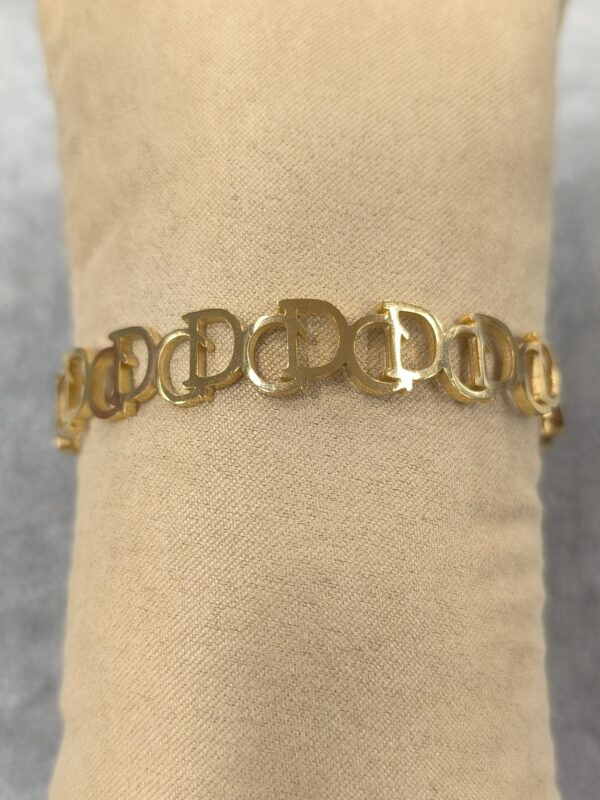 Pulsera dorada CD