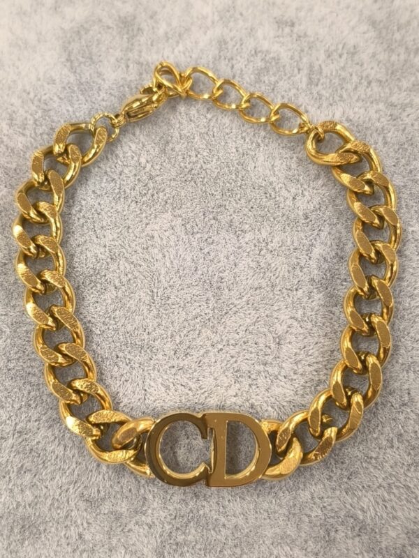 Pulsera de eslabón CD dorado mate
