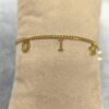 Pulsera dorada DI*R