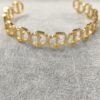 Pulsera dorada CD