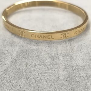 Pulsera dorada con nombre CC