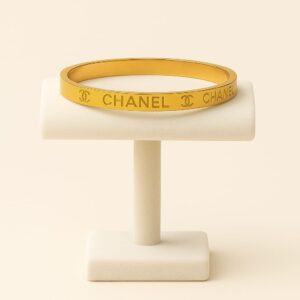 Pulsera dorada con nombre CC
