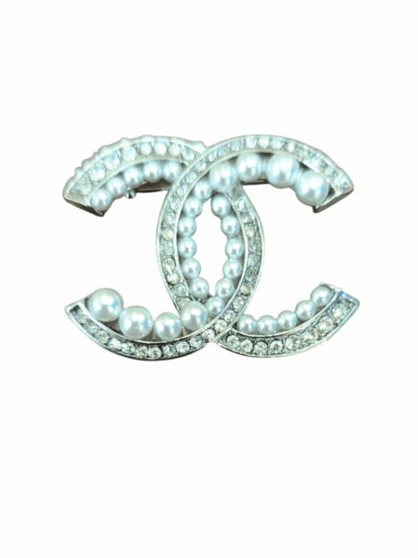 Broche dorado de perlas y brillantes