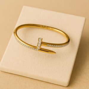 Pulsera clavo dorada con brillantes